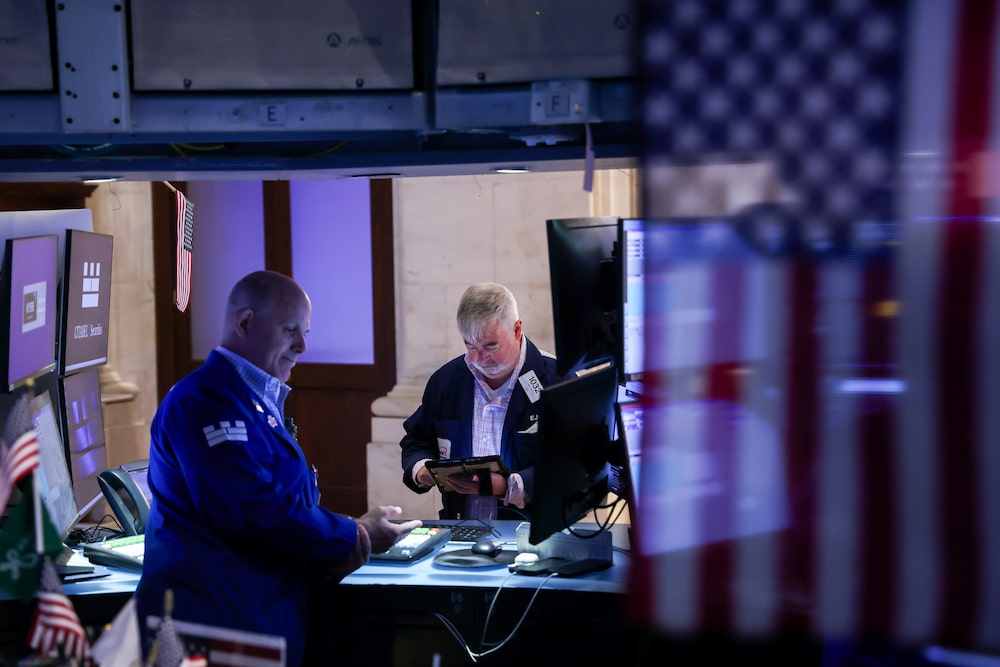 Traders work on the floor of the New York Stock Exchange (NYSE) in New York, US, on Monday, July 6, 2026. US President Donald Trump rang the opening bell for the New York Stock Exchange and the Nasdaq from the Oval Office on Monday, a celebratory event to mark the launch of Trump Accounts, a new investment vehicle for children. Photographer: Michael Nagle/Bloomberg Traders work on the floor of the New York Stock Exchange (NYSE) in New York, US, on Monday, July 6, 2026. US President Donald Trump rang the opening bell for the New York Stock Exchange and the Nasdaq from the Oval Office on Monday, a celebratory event to mark the launch of Trump Accounts, a new investment vehicle for children. Photographer: Michael Nagle/Bloomberg
