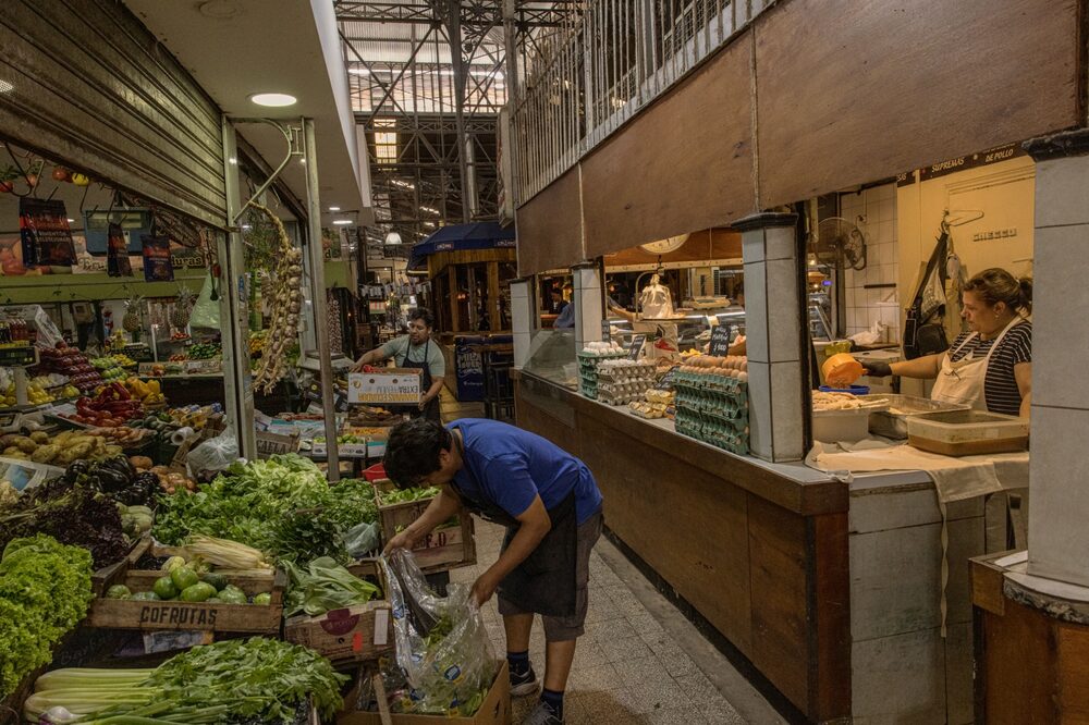 Food vendors in the Mercado de San Telmo in Buenos Aires, Argentina, on Wednesday, March 29, 2023. Argentina's economic activity rose 2.9% year over year, more than economists expected in January. Photographer: Sarah Pabst/Bloomberg Food vendors in the Mercado de San Telmo in Buenos Aires, Argentina, on Wednesday, March 29, 2023. Argentina's economic activity rose 2.9% year over year, more than economists expected in January. Photographer: Sarah Pabst/Bloomberg