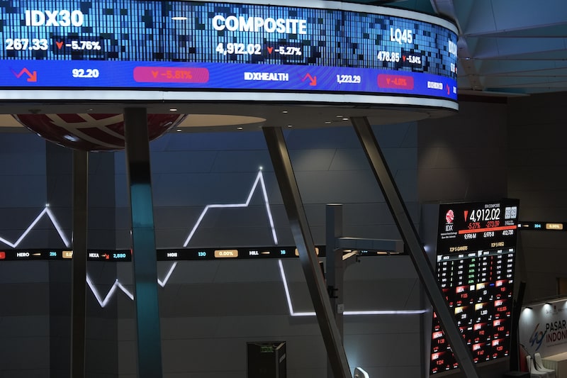 Stock market information displayed inside the Indonesia Stock Exchange. Stock market information displayed inside the Indonesia Stock Exchange.