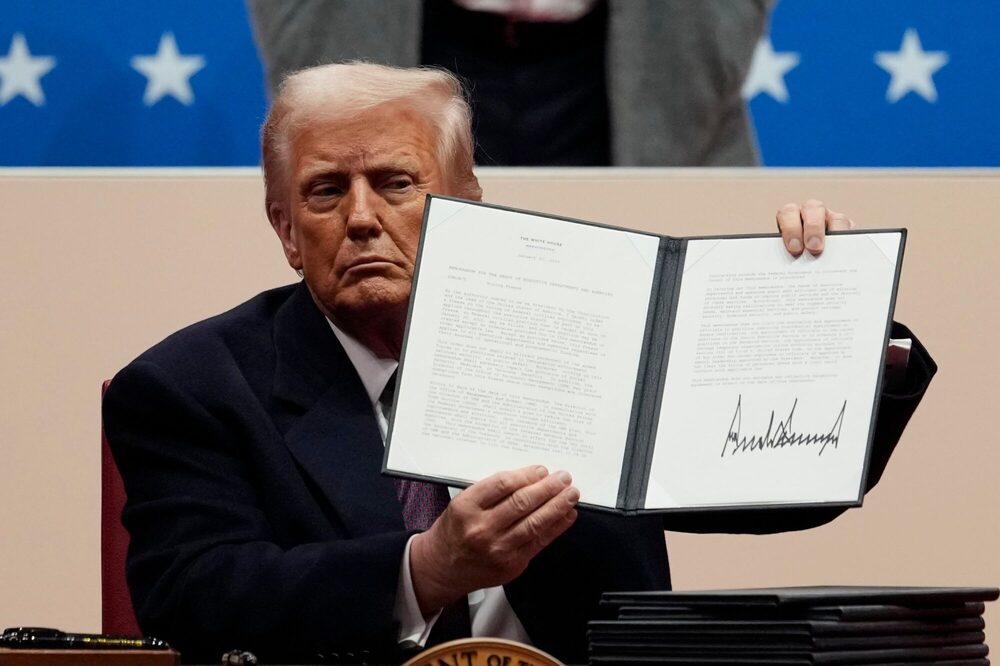 US President Donald Trump holds a signed executive order during the 60th presidential inauguration parade at Capital One Arena in Washington, DC, US, on Monday, Jan. 20, 2025. President Donald Trump launched his second term with a strident inaugural address that vowed to prioritize America's interests with a "golden age" for the country, while taking on "a radical and corrupt establishment." US President Donald Trump holds a signed executive order during the 60th presidential inauguration parade at Capital One Arena in Washington, DC, US, on Monday, Jan. 20, 2025. President Donald Trump launched his second term with a strident inaugural address that vowed to prioritize America's interests with a "golden age" for the country, while taking on "a radical and corrupt establishment."
