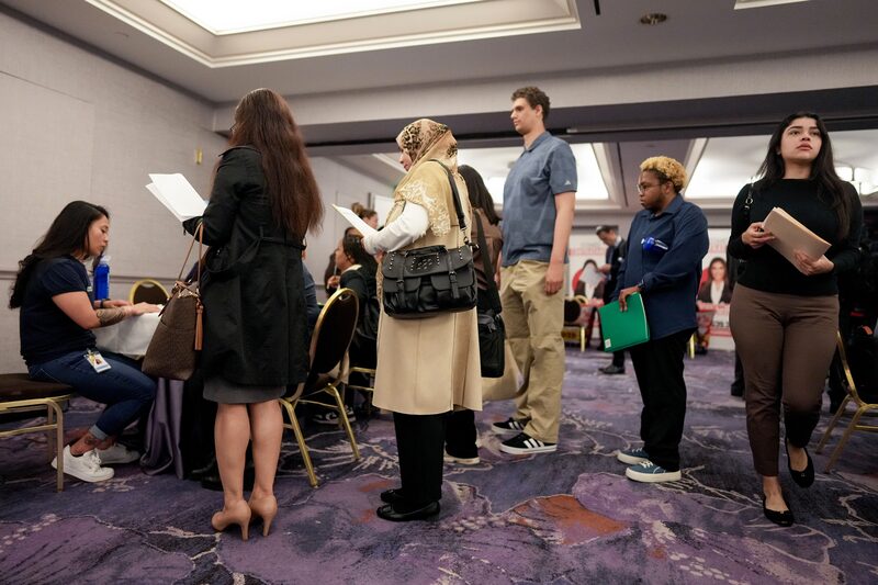 Job Seekers At A Career Fair As Jobless Claims Figures Decline To Lowest Since Early February Job Seekers At A Career Fair As Jobless Claims Figures Decline To Lowest Since Early February