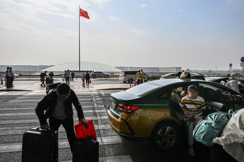 Travelers at Beijing Capital International Airport Ahead of Golden Week Travelers at Beijing Capital International Airport Ahead of Golden Week