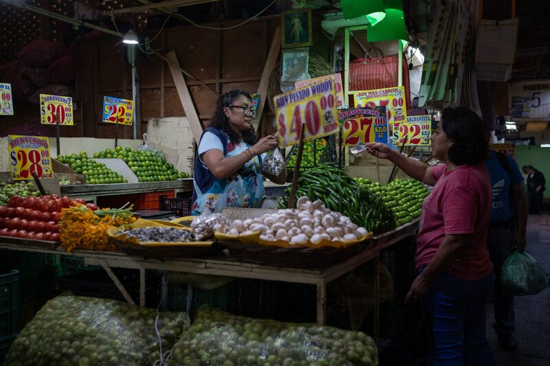 A shopper buys produce at the La Merced market in Mexico City, Mexico, on Thursday, Feb. 8, 2024. Mexico's central bank is expected to hold the benchmark rate at 11.25% for a seventh consecutive meeting as accelerating non-core inflation rises due to higher food and energy prices. Photographer: Victoria Razo/Bloomberg A shopper buys produce at the La Merced market in Mexico City, Mexico, on Thursday, Feb. 8, 2024. Mexico's central bank is expected to hold the benchmark rate at 11.25% for a seventh consecutive meeting as accelerating non-core inflation rises due to higher food and energy prices. Photographer: Victoria Razo/Bloomberg