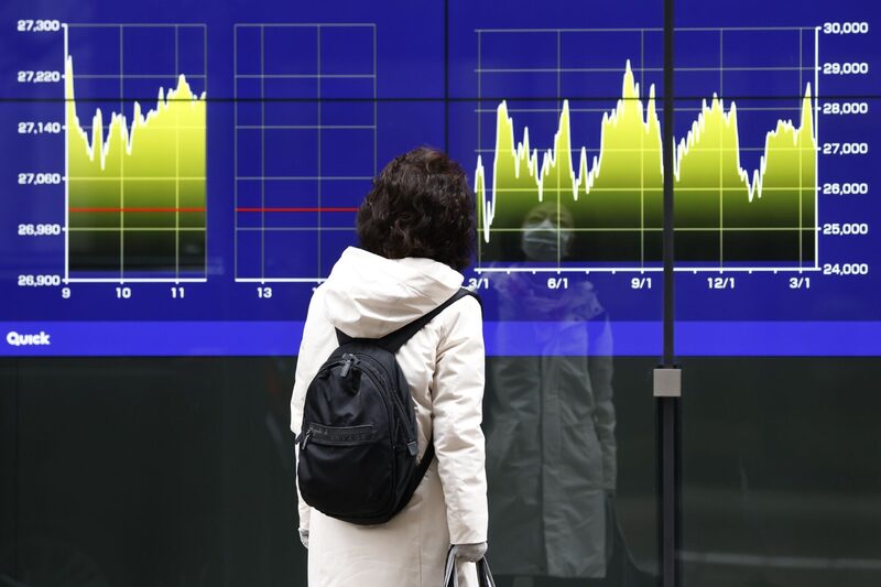 Painel de ações em Tóquio Painel de ações em Tóquio
