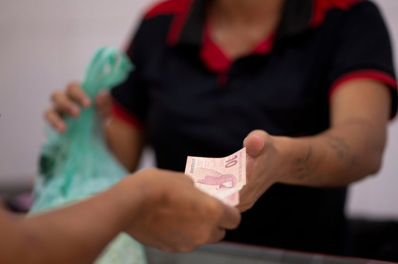 The Brazilian real was little changed against the dollar on Tuesday. Photographer: Andressa Anholete/Bloomberg The Brazilian real was little changed against the dollar on Tuesday. Photographer: Andressa Anholete/Bloomberg