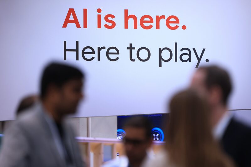 A slogan which reads "AI is here. Here to play", at the Google booth at the Hannover Messe 2024 trade fair in Germany, on April 22 A slogan which reads "AI is here. Here to play", at the Google booth at the Hannover Messe 2024 trade fair in Germany, on April 22