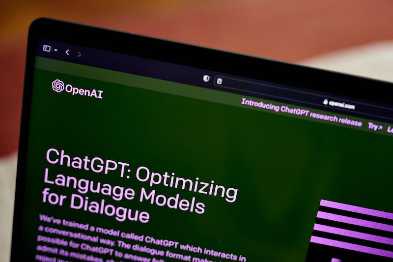 La página "Acerca de" de ChatGPT en el sitio web de OpenAI, vista en un ordenador portátil. La página "Acerca de" de ChatGPT en el sitio web de OpenAI, vista en un ordenador portátil.