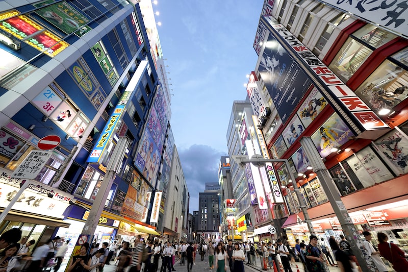 Commercial buildings and retail stores stand illuminated at dusk in the district of Akihabara in Tokyo, Japan, on Wednesday, July 24, 2019. Photographer: Toru Hanai/Bloomberg Commercial buildings and retail stores stand illuminated at dusk in the district of Akihabara in Tokyo, Japan, on Wednesday, July 24, 2019. Photographer: Toru Hanai/Bloomberg