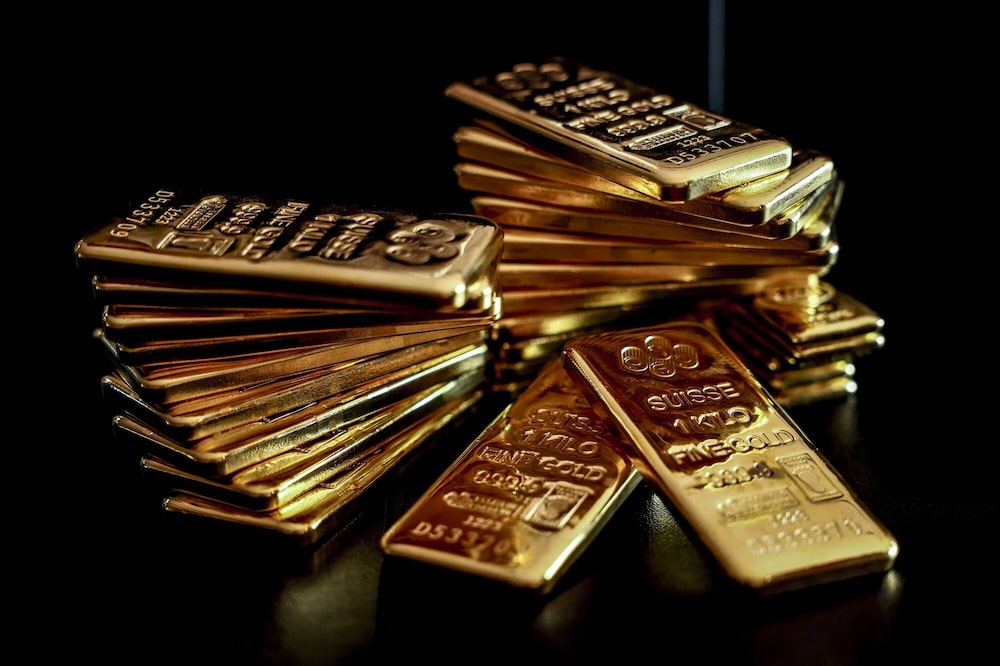 Lingotes de oro de un kilogramo en la sede de YLG Bullion International Co. en Bangkok, Tailandia. Lingotes de oro de un kilogramo en la sede de YLG Bullion International Co. en Bangkok, Tailandia.