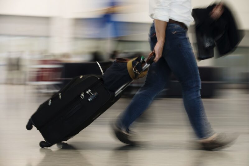 A traveler pulls luggage through Toronto Pearson International Airport (YYZ) in Toronto, Ontario, Canada. A traveler pulls luggage through Toronto Pearson International Airport (YYZ) in Toronto, Ontario, Canada.