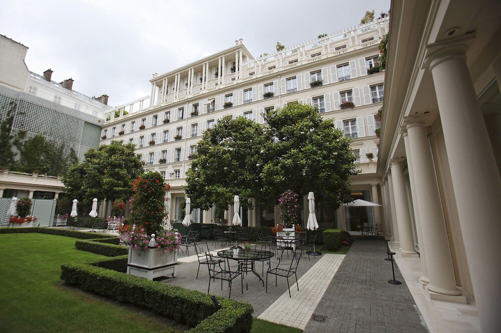 Trees line the garden at Le Bristol hotel in Paris, France, on Tuesday, June 14, 2011. Eight deluxe French hotels were crowned with the rare distinction of "palace" status in May, a new industry classification for luxury that goes beyond a mere five stars. Four Paris hotels, the Bristol, the Meurice, the Park Hyatt and the Plaza Athenee made the list. Photographer: Simon Dawson/Bloomberg Trees line the garden at Le Bristol hotel in Paris, France, on Tuesday, June 14, 2011. Eight deluxe French hotels were crowned with the rare distinction of "palace" status in May, a new industry classification for luxury that goes beyond a mere five stars. Four Paris hotels, the Bristol, the Meurice, the Park Hyatt and the Plaza Athenee made the list. Photographer: Simon Dawson/Bloomberg