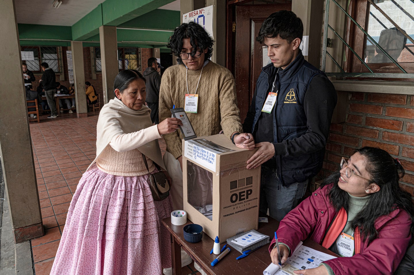 A voter casts a ballot at a polling station during the runoff presidential election in La Paz, Bolivia, on Sunday, Oct. 19, 2025. Bolivians are voting in a presidential runoff to decide which of two pro-business candidates they trust to lead them out of their deepest economic crisis in forty years. Photographer: Marcelo Perez del Carpio/Bloomberg A voter casts a ballot at a polling station during the runoff presidential election in La Paz, Bolivia, on Sunday, Oct. 19, 2025. Bolivians are voting in a presidential runoff to decide which of two pro-business candidates they trust to lead them out of their deepest economic crisis in forty years. Photographer: Marcelo Perez del Carpio/Bloomberg