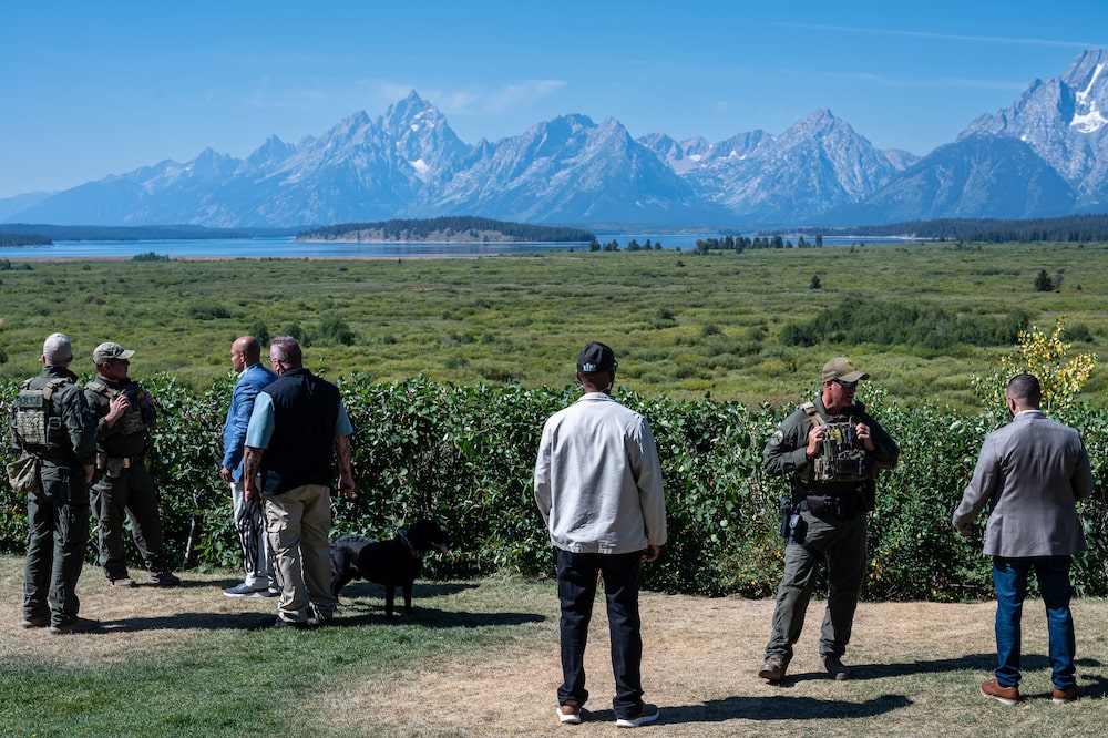 US Park Police (USPP) officers patrol the grounds at the Jackson Lake Lodge during the Kansas City Federal Reserve's Jackson Hole Economic Policy Symposium in Moran, Wyoming, US, on Saturday, Aug. 23, 2025. Federal Reserve Chair Jerome Powell carefully opened the door to an interest-rate cut in September, pointing to rising risks for the labor market even as worries over inflation remain. Photographer: David Paul Morris/Bloomberg US Park Police (USPP) officers patrol the grounds at the Jackson Lake Lodge during the Kansas City Federal Reserve's Jackson Hole Economic Policy Symposium in Moran, Wyoming, US, on Saturday, Aug. 23, 2025. Federal Reserve Chair Jerome Powell carefully opened the door to an interest-rate cut in September, pointing to rising risks for the labor market even as worries over inflation remain. Photographer: David Paul Morris/Bloomberg