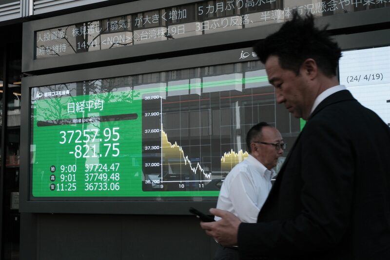 An electronic stock board displays the Nikkei 225 Stock Average outside a securities firm in Tokyo, in Tokyo, Japan, on April 19, 2024. The Nikkei had its biggest weekly drop since June 2022 amid a global selloff in stocks as the outlook for US interest rates and tensions in the Middle East spooked investors. Photographer: Soichiro Koriyama/Bloomberg An electronic stock board displays the Nikkei 225 Stock Average outside a securities firm in Tokyo, in Tokyo, Japan, on April 19, 2024. The Nikkei had its biggest weekly drop since June 2022 amid a global selloff in stocks as the outlook for US interest rates and tensions in the Middle East spooked investors. Photographer: Soichiro Koriyama/Bloomberg