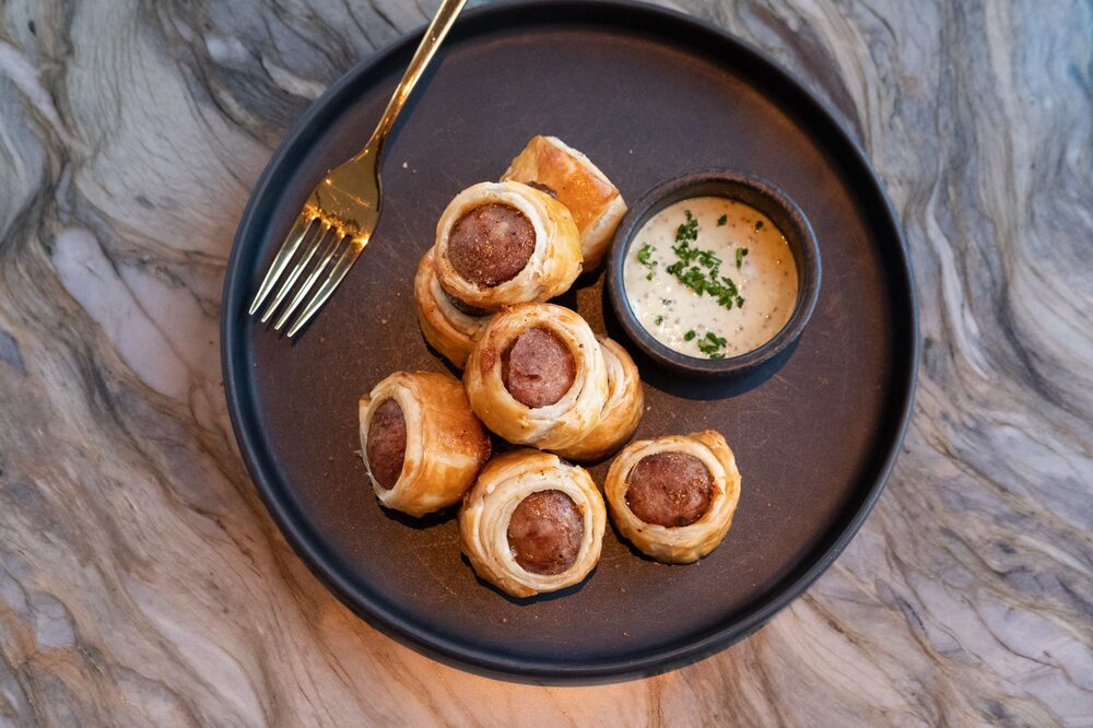 Ready to grab, pigs in a blanket. Fork optional. Photographer: Evan Ortiz/Bloomberg Ready to grab, pigs in a blanket. Fork optional. Photographer: Evan Ortiz/Bloomberg