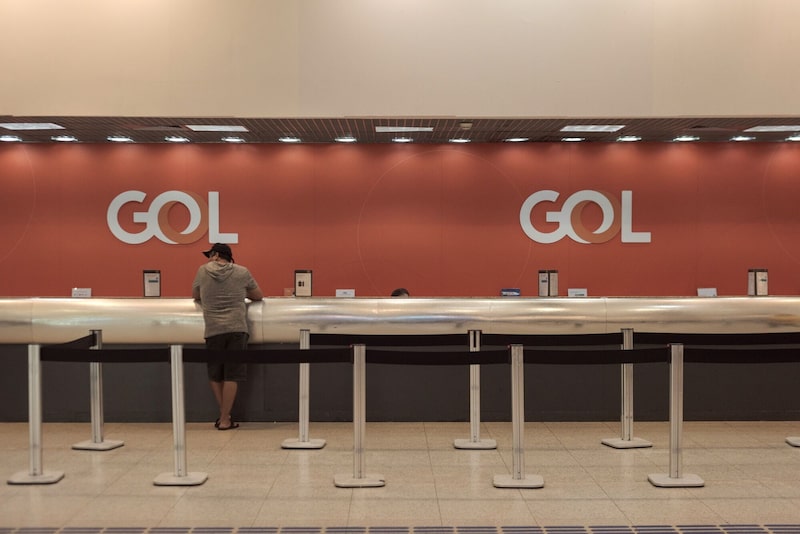 A traveler checks in at the Gol Airlines ticket counter at Santos Dumont Airport (SDU) in Rio de Janeiro, Brazil, on Sunday, Jan. 28, 2024. Gol Aereas Inteligentes SA filed for bankruptcy, capping the Brazilian airline's ill-fated efforts to bounce back from the Covid-19 pandemic. Photographer: Leonardo Carrato/Bloomberg A traveler checks in at the Gol Airlines ticket counter at Santos Dumont Airport (SDU) in Rio de Janeiro, Brazil, on Sunday, Jan. 28, 2024. Gol Aereas Inteligentes SA filed for bankruptcy, capping the Brazilian airline's ill-fated efforts to bounce back from the Covid-19 pandemic. Photographer: Leonardo Carrato/Bloomberg