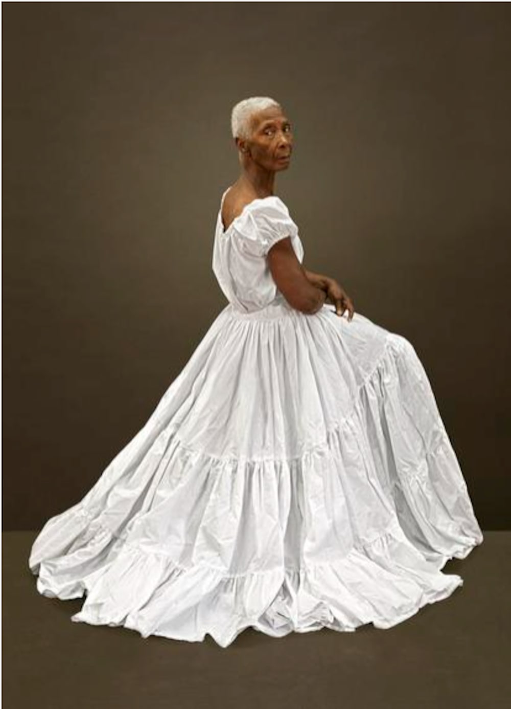 One of the older women in the group of portraits taken by Ruby Rumié One of the older women in the group of portraits taken by Ruby Rumié