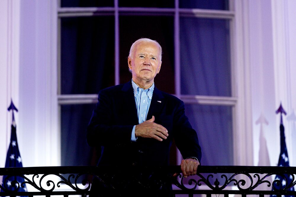 US President Joe Biden arrives to view the Independence Day fireworks display over the National Mall from the Truman Balcony of the White House in Washington, DC, US, on Thursday, July 4, 2024. Biden's reelection campaign limped into the US Independence Day holiday, exhausted by a week of the incumbent clawing to maintain his hold on his party's nomination. Photographer: Tierney L. Cross/Bloomberg US President Joe Biden arrives to view the Independence Day fireworks display over the National Mall from the Truman Balcony of the White House in Washington, DC, US, on Thursday, July 4, 2024. Biden's reelection campaign limped into the US Independence Day holiday, exhausted by a week of the incumbent clawing to maintain his hold on his party's nomination. Photographer: Tierney L. Cross/Bloomberg