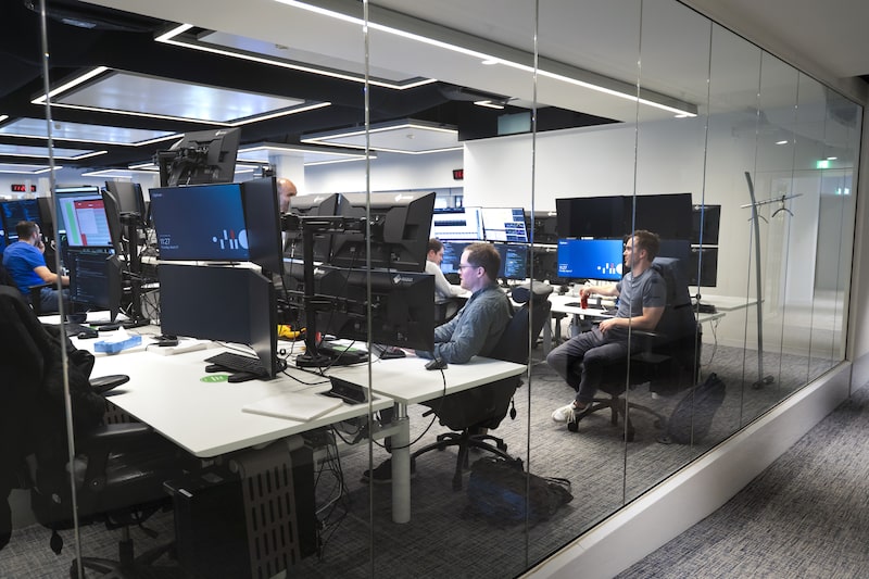 The trading floor at the Optiver VOF headquarters in Amsterdam, Netherlands, on Thursday, March 27, 2025. Optiver, the Amsterdam-based firm that's a loose Dutch portmanteau of "options trader" plans to bolster US staff to more than 600 from 530 by year-end. Photographer: Lina Selg/Bloomberg The trading floor at the Optiver VOF headquarters in Amsterdam, Netherlands, on Thursday, March 27, 2025. Optiver, the Amsterdam-based firm that's a loose Dutch portmanteau of "options trader" plans to bolster US staff to more than 600 from 530 by year-end. Photographer: Lina Selg/Bloomberg