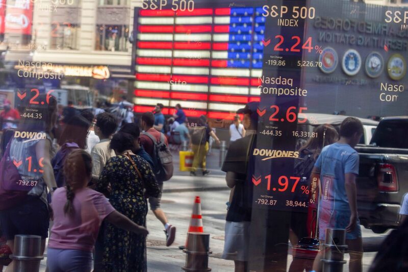 Stock market information displayed at the Nasdaq MarketSite in New York, US, on Monday, Aug. 5, 2024. A selloff in the riskier corners of the global market deepened, with stocks plunging and traders rushing to the safety of bonds as concerns about a slowdown in the world's largest economy intensified. Photographer: Michael Nagle/Bloomberg Stock market information displayed at the Nasdaq MarketSite in New York, US, on Monday, Aug. 5, 2024. A selloff in the riskier corners of the global market deepened, with stocks plunging and traders rushing to the safety of bonds as concerns about a slowdown in the world's largest economy intensified. Photographer: Michael Nagle/Bloomberg