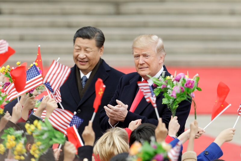 Donald Trump, à direita, e Xi Jinping Donald Trump, à direita, e Xi Jinping