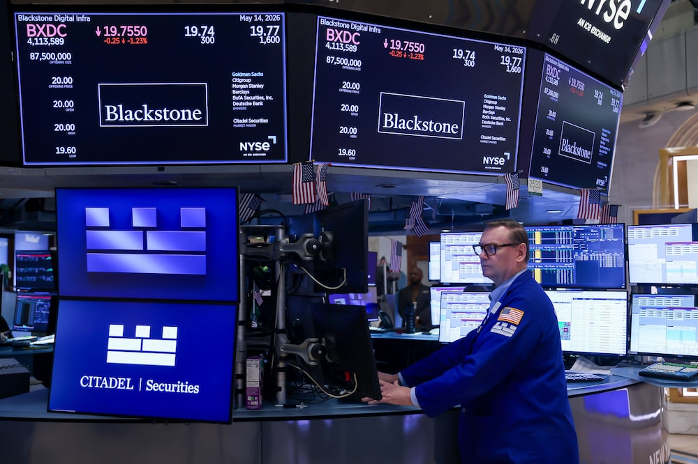 Blackstone Digital Infrastructure Trust Inc. signage during the company's initial public offering (IPO) on the floor of the New York Stock Exchange (NYSE) in New York, US, on Thursday, May 14, 2026. Blackstone Digital Infrastructure Trust Inc. raised $1.75 billion in a US initial public offering, as investors' appetite for artificial intelligence infrastructure shows no sign of easing. Photographer: Michael Nagle/Bloomberg Blackstone Digital Infrastructure Trust Inc. signage during the company's initial public offering (IPO) on the floor of the New York Stock Exchange (NYSE) in New York, US, on Thursday, May 14, 2026. Blackstone Digital Infrastructure Trust Inc. raised $1.75 billion in a US initial public offering, as investors' appetite for artificial intelligence infrastructure shows no sign of easing. Photographer: Michael Nagle/Bloomberg