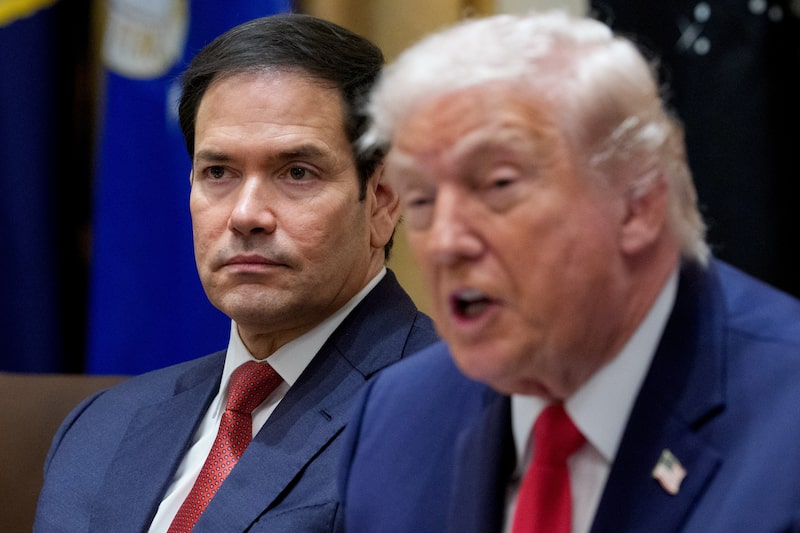 Trump junto a Marco Rubio. Trump junto a Marco Rubio.