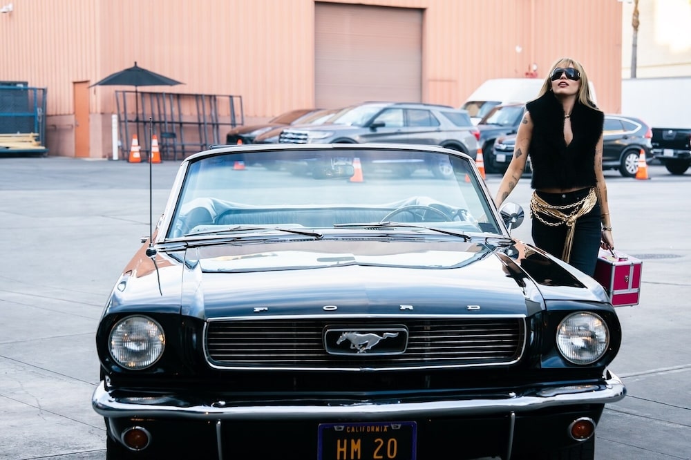 Miley Cyrus como Hannah Montana Miley Cyrus como Hannah Montana