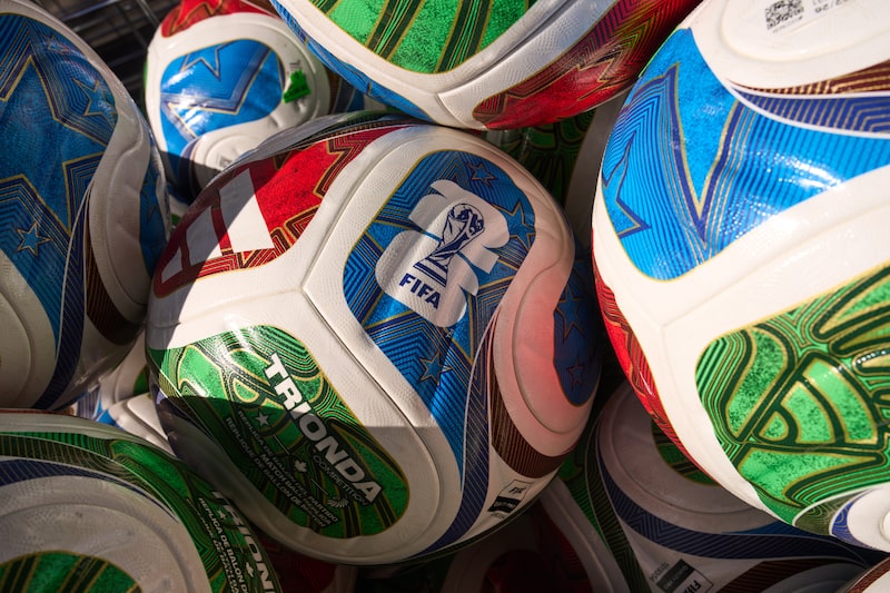 FIFA World Cup 2026 replica match balls for sale at a watch party hosted by Adidas at Brooklyn Bridge Park in the Brooklyn borough of New York, US, on Tuesday, June 16, 2026. The World Cup is back in the US for the first time since 1994 in its biggest version yet, encompassing 48 teams and 104 matches that are also being played in neighboring Canada and Mexico. Photographer: Bing Guan/Bloomberg FIFA World Cup 2026 replica match balls for sale at a watch party hosted by Adidas at Brooklyn Bridge Park in the Brooklyn borough of New York, US, on Tuesday, June 16, 2026. The World Cup is back in the US for the first time since 1994 in its biggest version yet, encompassing 48 teams and 104 matches that are also being played in neighboring Canada and Mexico. Photographer: Bing Guan/Bloomberg