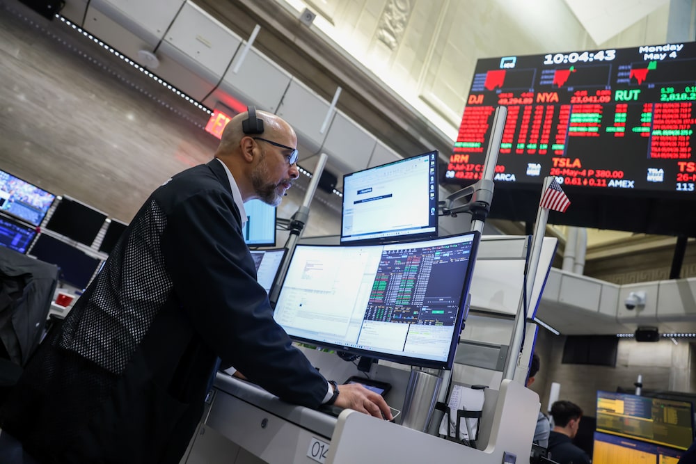 A trader works on the floor of the American Stock Exchange (AMEX) at the New York Stock Exchange (NYSE) in New York, US, on Monday, May 4, 2026. Stocks fell from all-time highs as oil climbed on concerns that heightened Middle East tensions could threaten a fragile ceasefire, keeping energy costs elevated while fueling inflation risks. Photographer: Michael Nagle/Bloomberg A trader works on the floor of the American Stock Exchange (AMEX) at the New York Stock Exchange (NYSE) in New York, US, on Monday, May 4, 2026. Stocks fell from all-time highs as oil climbed on concerns that heightened Middle East tensions could threaten a fragile ceasefire, keeping energy costs elevated while fueling inflation risks. Photographer: Michael Nagle/Bloomberg