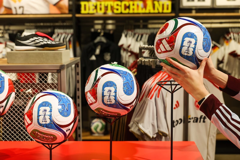 A display of Adidas AG World Cup 2026 footballs in their flagship store in Herzogenaurach, Germany, on Wednesday, March 4, 2026. Adidas forecast higher profits this year and market share gains through 2028 as the German brand looks to maintain its momentum with retro sneakers and new running and football products. Photographer: Alex Kraus/Bloomberg A display of Adidas AG World Cup 2026 footballs in their flagship store in Herzogenaurach, Germany, on Wednesday, March 4, 2026. Adidas forecast higher profits this year and market share gains through 2028 as the German brand looks to maintain its momentum with retro sneakers and new running and football products. Photographer: Alex Kraus/Bloomberg