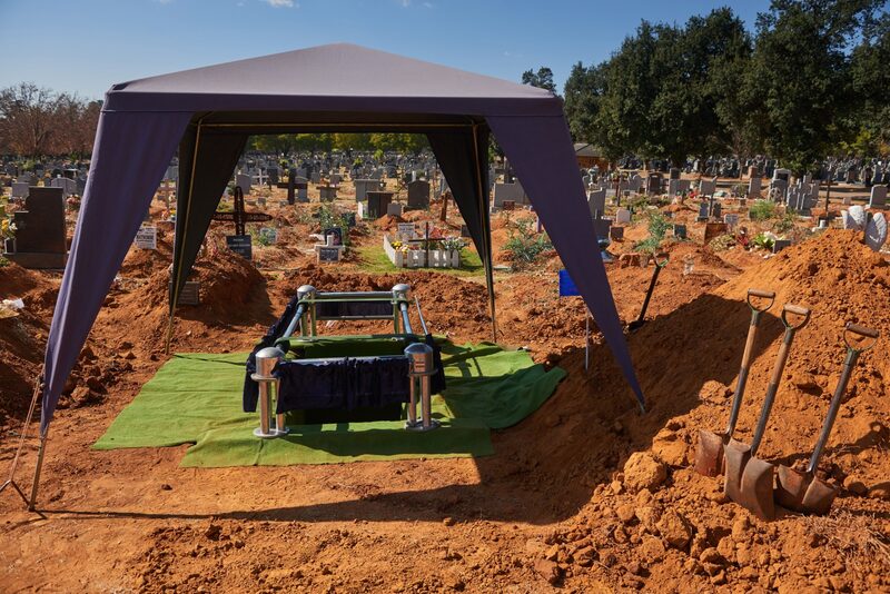 A fresh grave prepared for a funeral service in Westbury Park Cemetery in Johannesburg, South Africa, on Thursday, June 24, 2021. Photographer: Waldo Swiegers/Bloomberg A fresh grave prepared for a funeral service in Westbury Park Cemetery in Johannesburg, South Africa, on Thursday, June 24, 2021. Photographer: Waldo Swiegers/Bloomberg