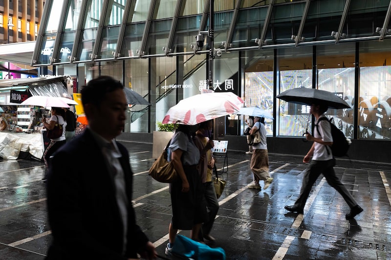 People walk on the street in central area, in Hong Kong, China on Thursday, July 30, 2026. Photographer: Billy H.C. Kwok/ Bloomberg People walk on the street in central area, in Hong Kong, China on Thursday, July 30, 2026. Photographer: Billy H.C. Kwok/ Bloomberg