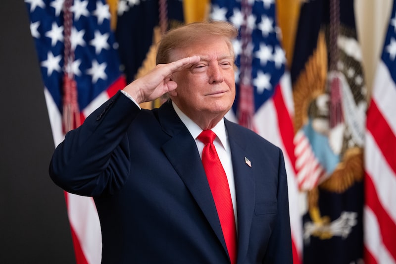 US President Donald Trump salutes during the national anthem at a Columbus Day event in the East Room of the White House in Washington, DC, US, on Friday, Oct. 9, 2026. Trump is establishing a committee to investigate mortgage fraud allegations against Federal Reserve Governor Lisa Cook and is forcing her to appear at a White House hearing to defend herself. Photographer: Aaron Schwartz/Bloomberg US President Donald Trump salutes during the national anthem at a Columbus Day event in the East Room of the White House in Washington, DC, US, on Friday, Oct. 9, 2026. Trump is establishing a committee to investigate mortgage fraud allegations against Federal Reserve Governor Lisa Cook and is forcing her to appear at a White House hearing to defend herself. Photographer: Aaron Schwartz/Bloomberg