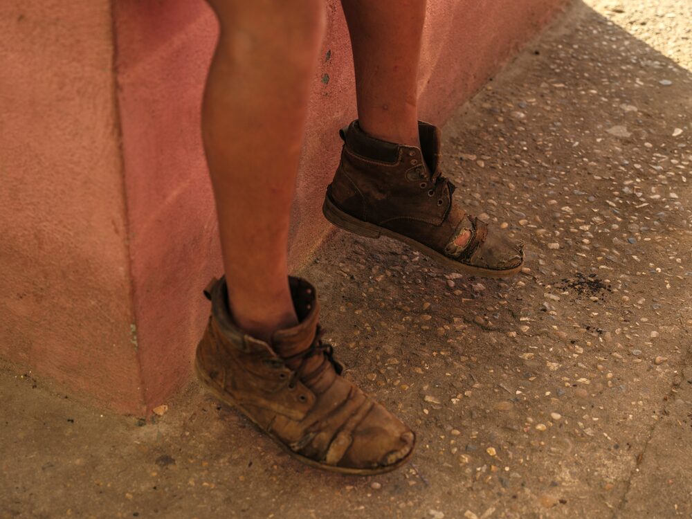 The boots of a Honduran migrant outside a migrant shelter in Villahermosa. Photographer: Alejandro Cegarra /Bloomberg The boots of a Honduran migrant outside a migrant shelter in Villahermosa. Photographer: Alejandro Cegarra /Bloomberg 