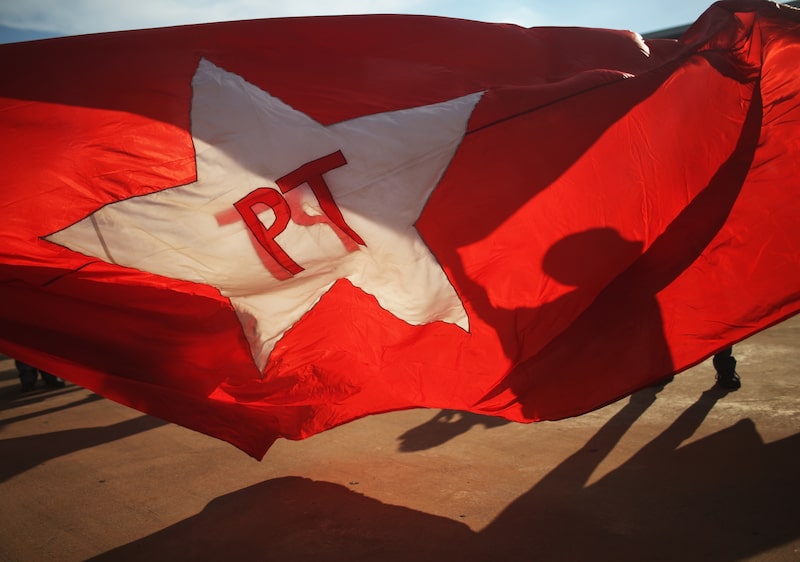 Votos de entregadores e motoristas de aplicativos se tornaram um campo de batalha central para tentativa de reeleição do presidente (Foto: Mario Tama/Getty Images) Votos de entregadores e motoristas de aplicativos se tornaram um campo de batalha central para tentativa de reeleição do presidente (Foto: Mario Tama/Getty Images)