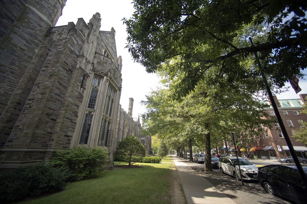 Cars sit parked near the Princeton University campus in Princeton, New Jersey, U.S., on Friday, Aug. 30, 2013. Residents in Princeton, New Jersey, have sued the municipality and the university, saying the school should lose its tax-exempt status because it shares royalties from patents with faculty. Photographer: Craig Warga/Bloomberg Cars sit parked near the Princeton University campus in Princeton, New Jersey, U.S., on Friday, Aug. 30, 2013. Residents in Princeton, New Jersey, have sued the municipality and the university, saying the school should lose its tax-exempt status because it shares royalties from patents with faculty. Photographer: Craig Warga/Bloomberg