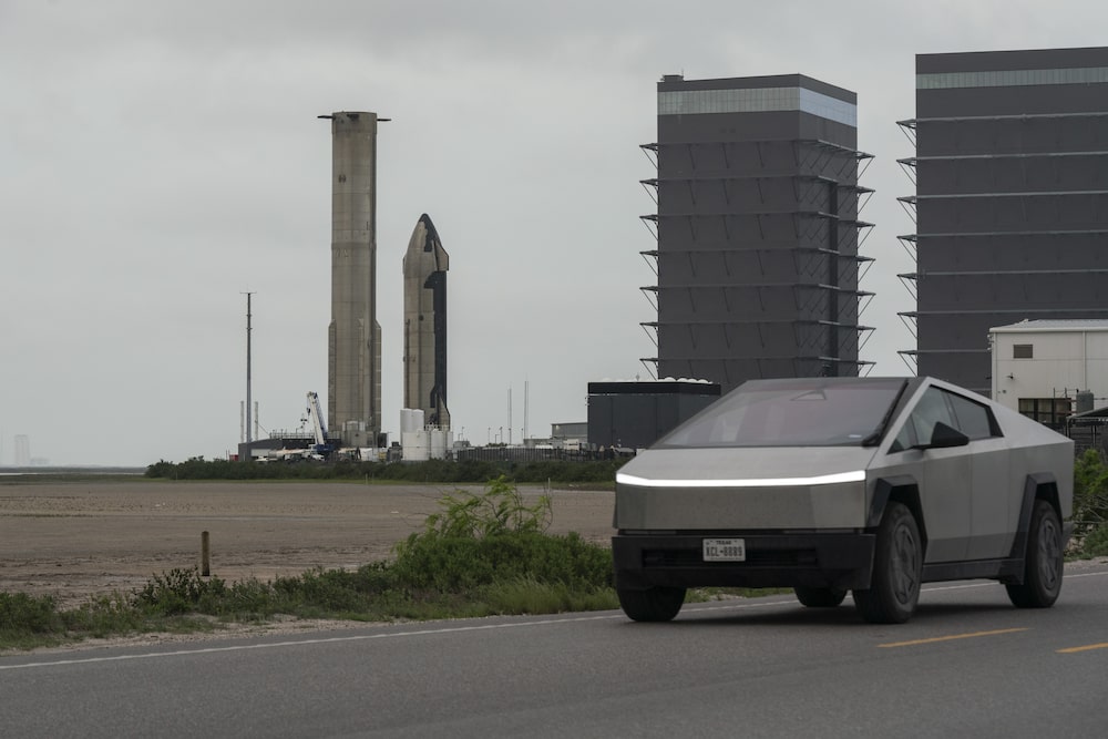 A Tesla Cybertruck vehicle drives past the SpaceX Starbase industrial complex and rocket launch facility in Starbase, Texas, US, on Thursday April 30, 2026. SpaceX's spaceport put Brownsville on the map, but locals fear being priced out by newly rich neighbors. Photographer: Gabriel V. Cardenas/Bloomberg A Tesla Cybertruck vehicle drives past the SpaceX Starbase industrial complex and rocket launch facility in Starbase, Texas, US, on Thursday April 30, 2026. SpaceX's spaceport put Brownsville on the map, but locals fear being priced out by newly rich neighbors. Photographer: Gabriel V. Cardenas/Bloomberg