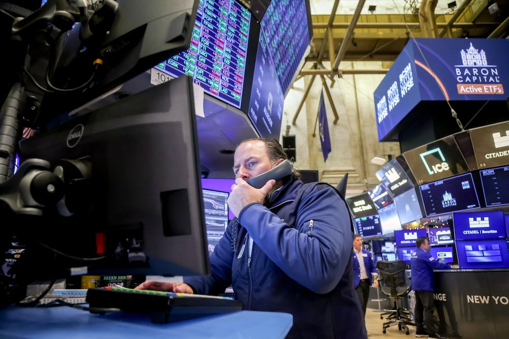 A trader works on the floor of the New York Stock Exchange (NYSE) in New York, US, on Monday, Dec. 15, 2025. The last full trading week of 2025 started with stocks falling and bonds rising as Wall Street geared up for key economic data that will help shape the Federal Reserve rate outlook. Photographer: Michael Nagle/Bloomberg A trader works on the floor of the New York Stock Exchange (NYSE) in New York, US, on Monday, Dec. 15, 2025. The last full trading week of 2025 started with stocks falling and bonds rising as Wall Street geared up for key economic data that will help shape the Federal Reserve rate outlook. Photographer: Michael Nagle/Bloomberg