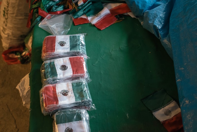Mexican national flags sit packaged into plastic packets in Toluca, Mexico. Photographer: Luis Antonio Rojas/Bloomberg Mexican national flags sit packaged into plastic packets in Toluca, Mexico. Photographer: Luis Antonio Rojas/Bloomberg