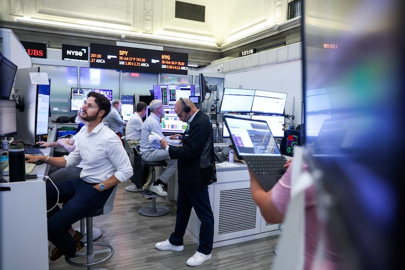 Traders work on the floor of the American Stock Exchange (AMEX) at the New York Stock Exchange (NYSE) in New York, US, on Tuesday, July 14, 2026. A cooler-than-estimated inflation reading spurred gains in both stocks and bonds, easing concern about imminent Federal Reserve interest-rate hikes amid a resurgence in oil prices. Photographer: Michael Nagle/Bloomberg Traders work on the floor of the American Stock Exchange (AMEX) at the New York Stock Exchange (NYSE) in New York, US, on Tuesday, July 14, 2026. A cooler-than-estimated inflation reading spurred gains in both stocks and bonds, easing concern about imminent Federal Reserve interest-rate hikes amid a resurgence in oil prices. Photographer: Michael Nagle/Bloomberg
