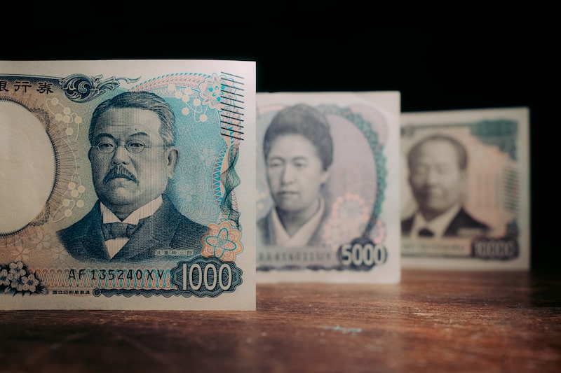 Japanese yen banknotes arranged in Kyoto, Japan. Photographer: Kentaro Takahashi/Bloomberg Japanese yen banknotes arranged in Kyoto, Japan. Photographer: Kentaro Takahashi/Bloomberg