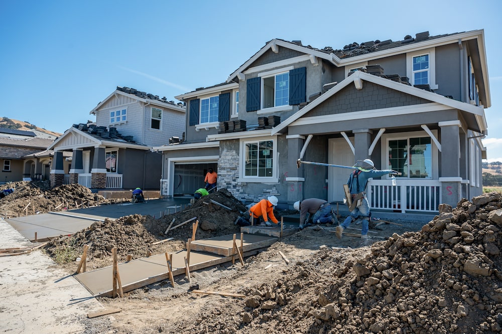 Workers outside a new home under construction at the Rosemary Grove community by Taylor Morrison in Vacaville, California, US, on Wednesday, Oct. 8, 2025. The US Census Bureau is expected to release housing starts figures on October 17. Photographer: David Paul Morris/Bloomberg Workers outside a new home under construction at the Rosemary Grove community by Taylor Morrison in Vacaville, California, US, on Wednesday, Oct. 8, 2025. The US Census Bureau is expected to release housing starts figures on October 17. Photographer: David Paul Morris/Bloomberg