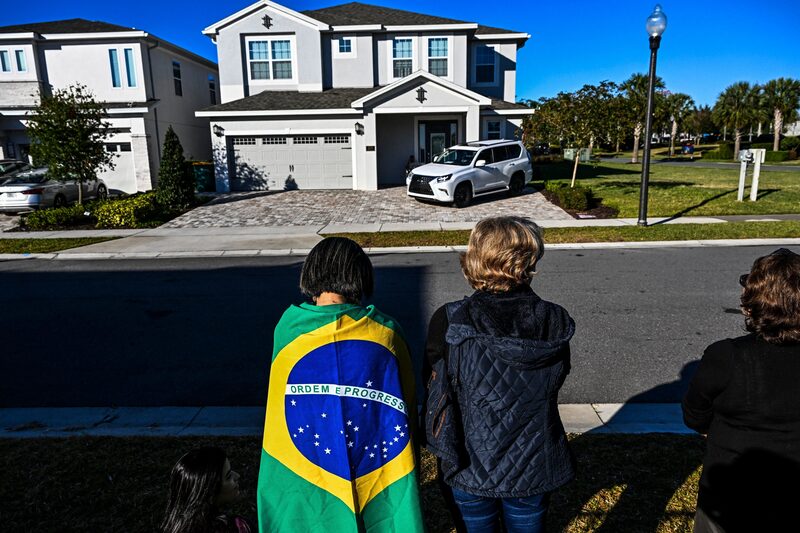 Supporters of Jair Bolsonaro outside his rental house at the Encore Resort at Reunion in Kissimmee, Florida. Supporters of Jair Bolsonaro outside his rental house at the Encore Resort at Reunion in Kissimmee, Florida.