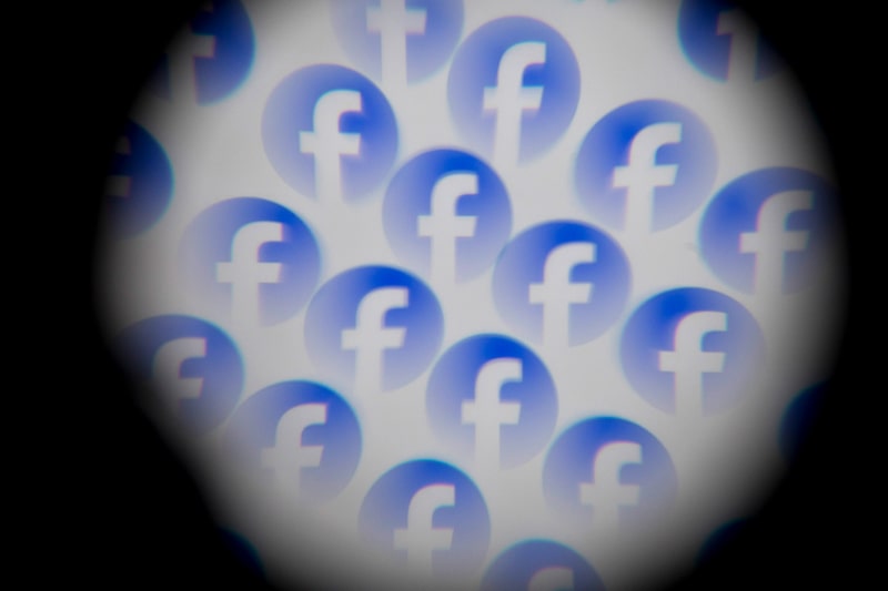 The Facebook log, shot through glass toy, arranged on a smartphone in Sydney, Australia, on Wednesday, Dec. 3, 2025. Photographer: Brent Lewin/Bloomberg The Facebook log, shot through glass toy, arranged on a smartphone in Sydney, Australia, on Wednesday, Dec. 3, 2025. Photographer: Brent Lewin/Bloomberg