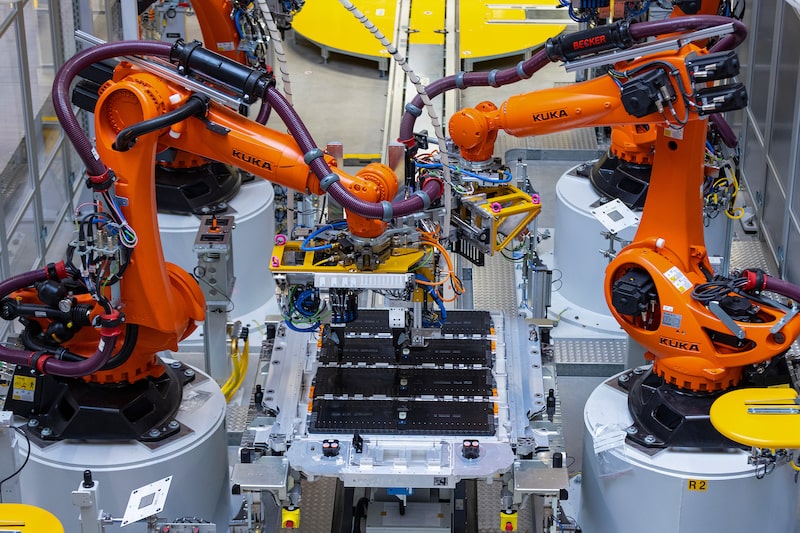 Robotic arms move high voltage batteries for the all-electric Mini Countryman in the BMW Group factory in Leipzig, Germany, on Thursday, March 21, 2024. New-vehicle registrations rose to 995,059 units last month, the European Automobile Manufacturers Association said Thursday. Photographer: Krisztian Bocsi/Bloomberg Robotic arms move high voltage batteries for the all-electric Mini Countryman in the BMW Group factory in Leipzig, Germany, on Thursday, March 21, 2024. New-vehicle registrations rose to 995,059 units last month, the European Automobile Manufacturers Association said Thursday. Photographer: Krisztian Bocsi/Bloomberg