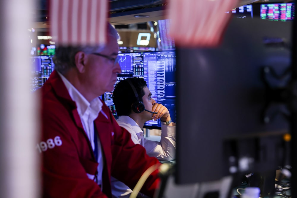 Traders work on the floor of the New York Stock Exchange (NYSE) in New York, US, on Monday, July 6, 2026. US President Donald Trump rang the opening bell for the New York Stock Exchange and the Nasdaq from the Oval Office on Monday, a celebratory event to mark the launch of Trump Accounts, a new investment vehicle for children. Photographer: Michael Nagle/Bloomberg Traders work on the floor of the New York Stock Exchange (NYSE) in New York, US, on Monday, July 6, 2026. US President Donald Trump rang the opening bell for the New York Stock Exchange and the Nasdaq from the Oval Office on Monday, a celebratory event to mark the launch of Trump Accounts, a new investment vehicle for children. Photographer: Michael Nagle/Bloomberg