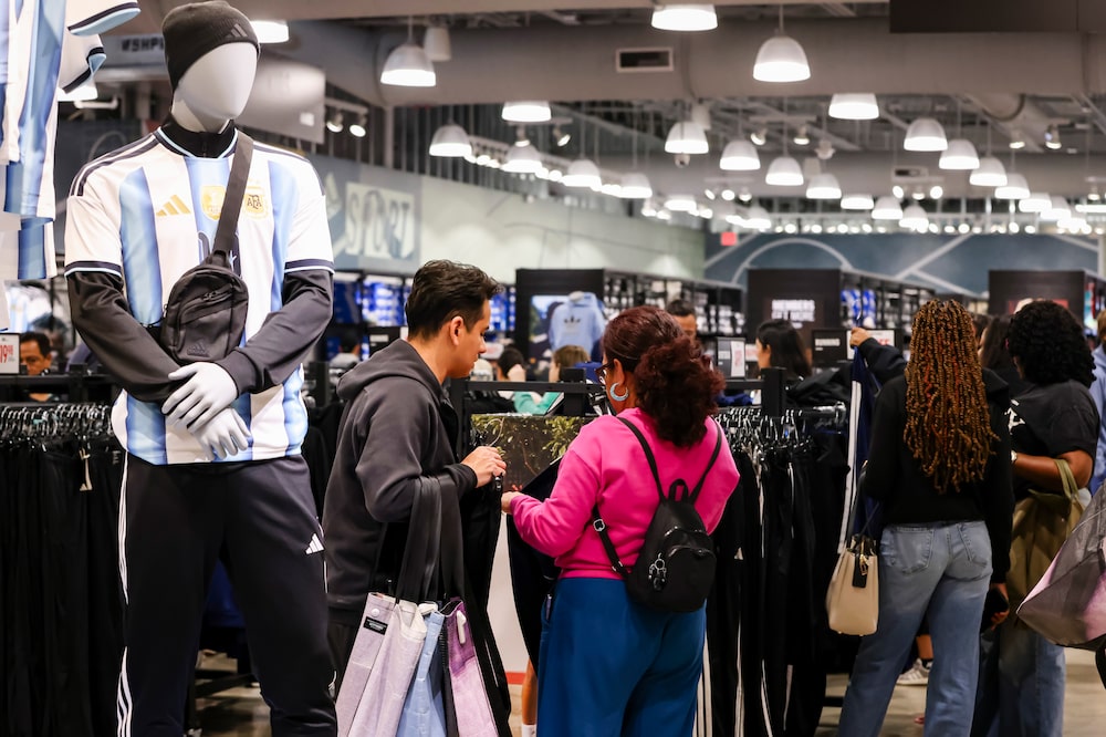 Shoppers inside an store at an outlet mall in Sunrise, Florida. Shoppers inside an store at an outlet mall in Sunrise, Florida.