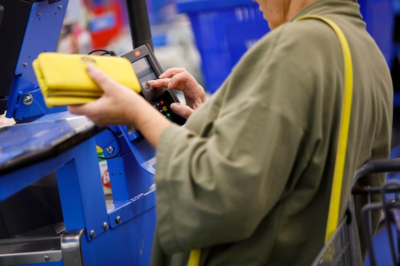 A customer uses a credit card terminal to complete a purchase at a Wal-Mart Stores Inc. location in Burbank, California, U.S., on Thursday, November 16, 2017. Photographer: Patrick T. Fallon/Bloomberg A customer uses a credit card terminal to complete a purchase at a Wal-Mart Stores Inc. location in Burbank, California, U.S., on Thursday, November 16, 2017. Photographer: Patrick T. Fallon/Bloomberg