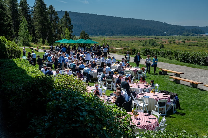 Attendees eat lunch during the Kansas City Federal Reserve's Jackson Hole Economic Policy Symposium in Moran, Wyoming, US, on Saturday, Aug. 23, 2025. Federal Reserve Chair Jerome Powell carefully opened the door to an interest-rate cut in September, pointing to rising risks for the labor market even as worries over inflation remain. Photographer: David Paul Morris/Bloomberg Attendees eat lunch during the Kansas City Federal Reserve's Jackson Hole Economic Policy Symposium in Moran, Wyoming, US, on Saturday, Aug. 23, 2025. Federal Reserve Chair Jerome Powell carefully opened the door to an interest-rate cut in September, pointing to rising risks for the labor market even as worries over inflation remain. Photographer: David Paul Morris/Bloomberg